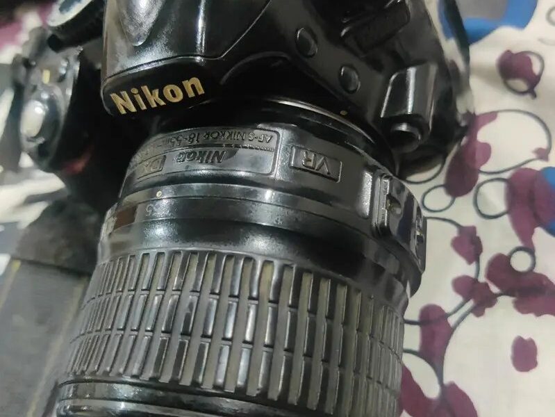 Nikon D3100 with 18 - 55 -